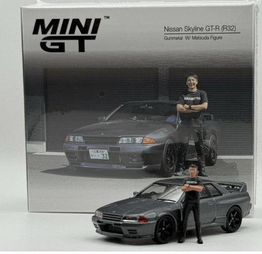 Mini GT - Nissan Skyline GT-R (R32) Nismo Gunmetal w/ Matsuda Figure